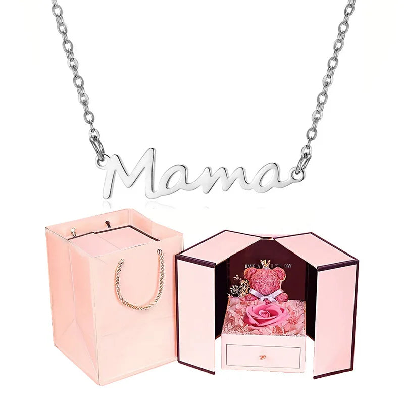 Celebrate Mom with our "Mama" Titanium Steel Necklace in a luxurious Pink Rose Bear Gift Box. A loving gift for Mother's Day 2024.