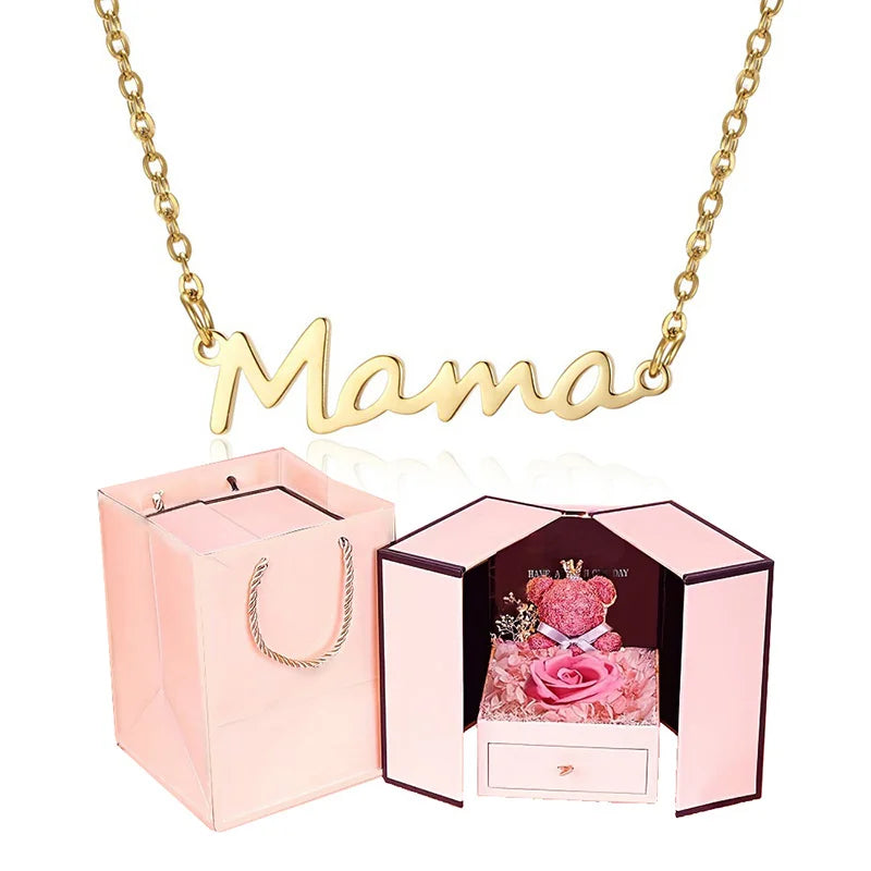 Celebrate Mom with our "Mama" Titanium Steel Necklace in a luxurious Pink Rose Bear Gift Box. A loving gift for Mother's Day 2024.
