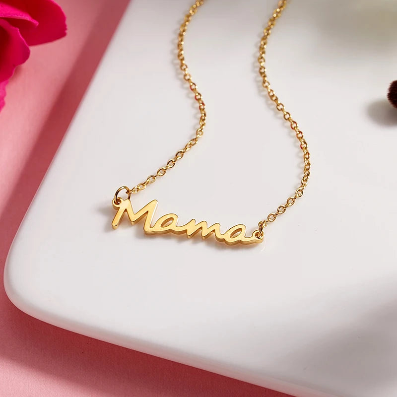 Celebrate Mom with our "Mama" Titanium Steel Necklace in a luxurious Pink Rose Bear Gift Box. A loving gift for Mother's Day 2024.