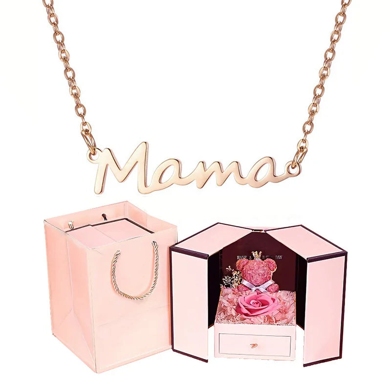 Celebrate Mom with our "Mama" Titanium Steel Necklace in a luxurious Pink Rose Bear Gift Box.  A loving gift for Mother's Day 2024.